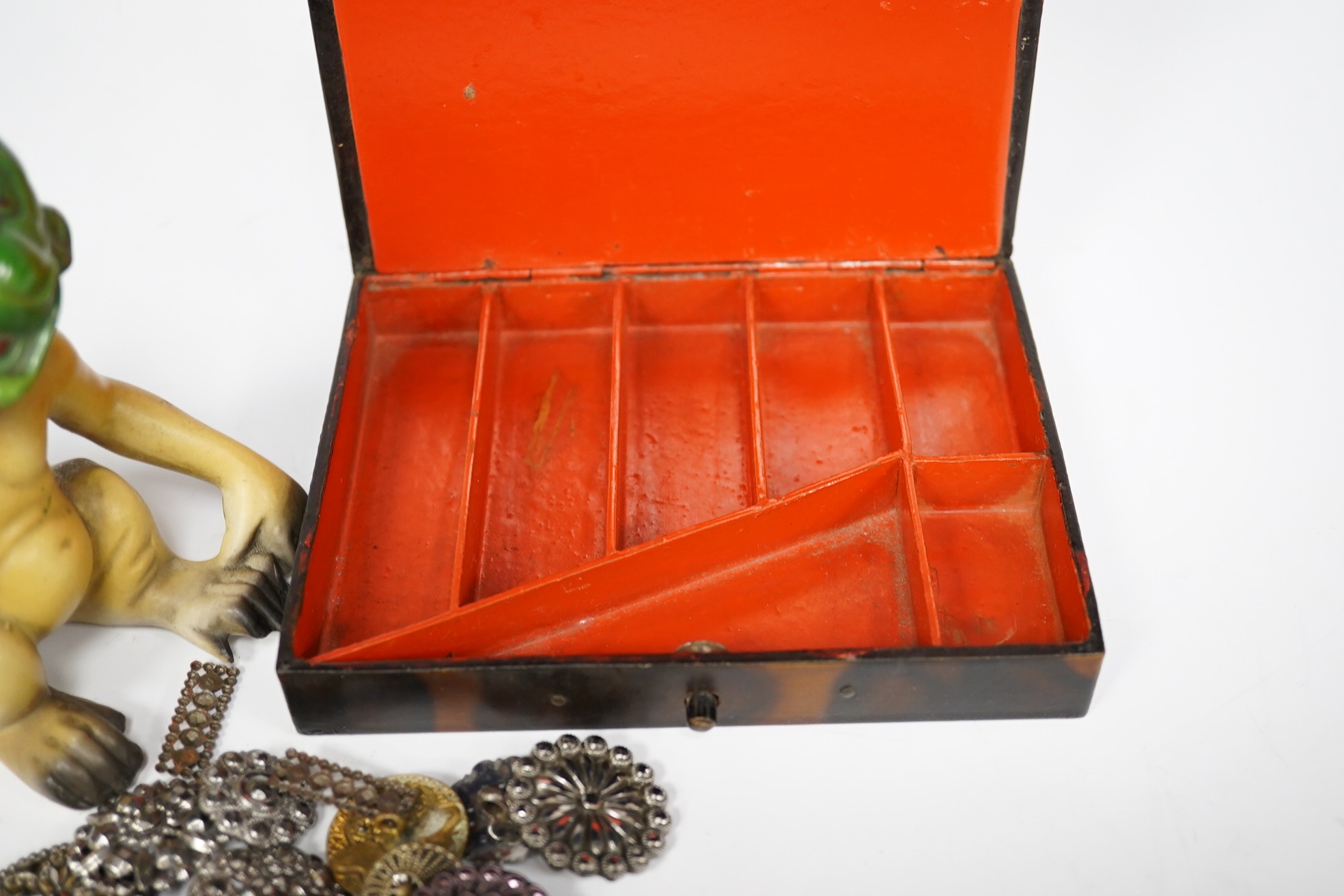 A Victorian papier mache box, a foreign porcelain novelty monkey and cut steel buttons, largest 13cm wide. Condition - fair